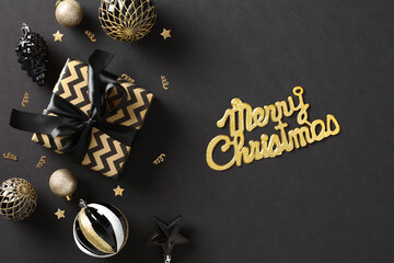 Chic Christmas composition with elegant art deco style decorations. Golden confetti, glittering...