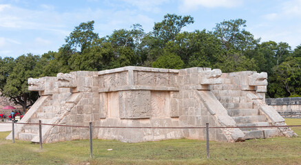 Fototapeta na wymiar Two large snake heads carved from stone at the ancient Mayan ruins at Chichen Itza, Mexico.