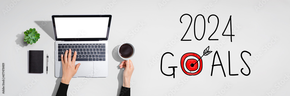 Poster 2024 goals concept with person using a laptop computer
