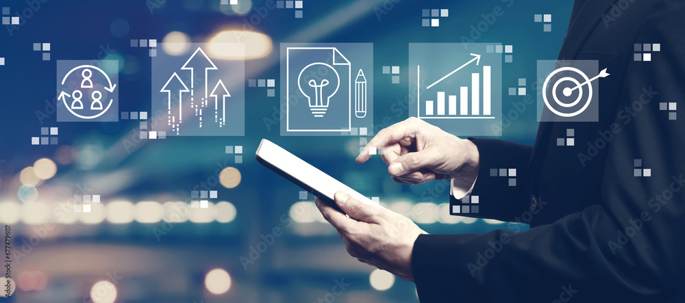 Poster idea of success theme with businessman using a tablet computer