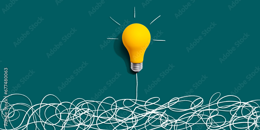 Poster clarifying complex ideas theme with light bulb - flat lay