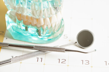 Fototapeta na wymiar Dental appointment reminder in calendar, healthy teeth, dental health care.