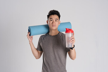 Image of Asian man exercising on white background