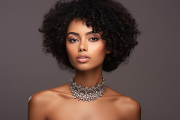 Black woman afro, portrait and confident face in beauty and style against a studio background, Beautiful isolated African American female proud model with necklace, jewelry and hairstyle for fashion - obrazy, fototapety, plakaty