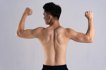 Fototapeta na wymiar Image of Asian male athlete with good physique on white background