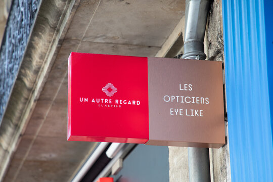 eye like and un autre regard logo text shop and brand sign entrance facade store french medic optician glasses