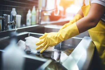 Poster Hands of woman, gloves and washing dishes in kitchen, brush chores and house work, cleaner service and home care, Cleaning, soap and water, housekeeper working in apartment with dirt and foam at sink © alisaaa