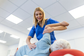 Senior woman having chiropractic back adjustment. Osteopathy, Alternative medicine, pain relief...