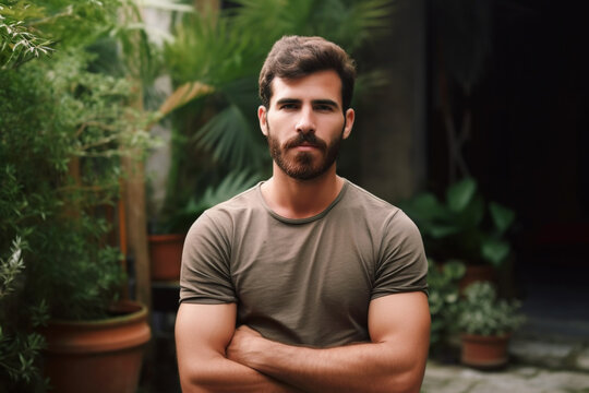 Portrait Of A Confident Young Man Standing In His Backyard