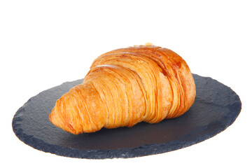 Crisp fresh croissants in the background