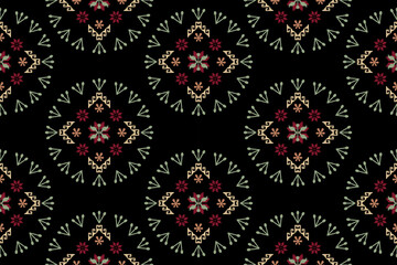 Beautiful seamless cross stitch pattern, oriental ethnic pattern, traditional green background. Abstract Aztec style vector illustration design for textures, fabric, clothing, wrapping, carpet decorat