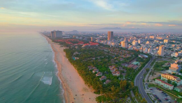 Stunning Aerial Shot Of Beachfront Resorts In Da Nang Vietnam During Colorful Sunset.