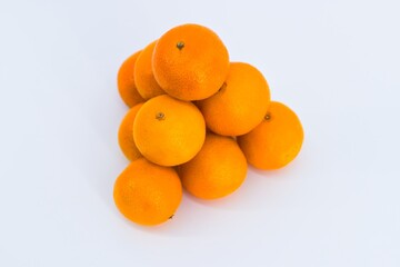 A vibrant image showcasing mandarins on a white background.