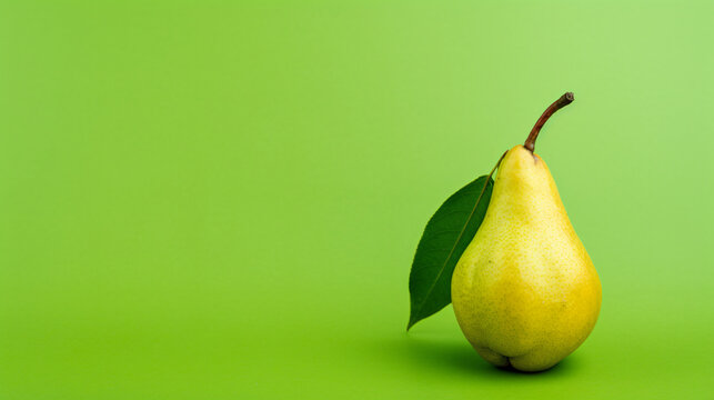 Pear fruit on a green background