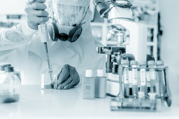 A scientist conducting a scientific experiment in a laboratory.