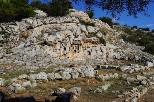 Ruins of the ancient temple of Aphrodite, or Venus, in Attica, Greece. The holes on the rock are for offerings to the goddess for love and fertility