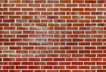 A textured brick wall background with pattern.