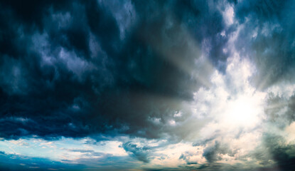 A dramatic, stormy sky with ominous clouds and moody atmosphere.