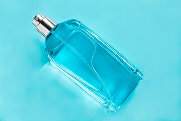 Light blue perfume bottle