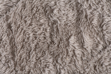 gray plush fabric texture background , background of soft fur warm material