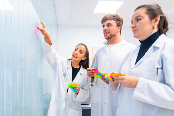 Scientist during a creative process in a cancer research lab