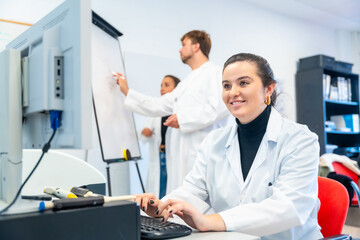 Scientist using computer in the office of a laboratory