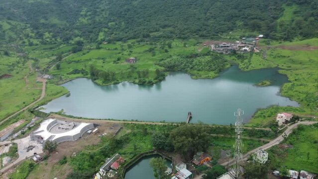 Aerial view of famous tourist attraction Ahilya Dam lush green landscape during monsoon, Trimbakeshwar, Nashik