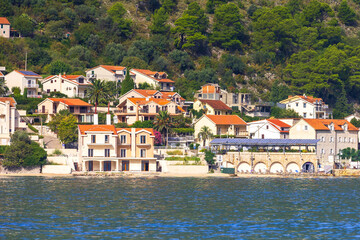 Fototapeta na wymiar Adriatic town by the sea, Montenegro, Kotor Bay
