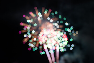 fireworks blurred background bokeh. abstract lights on blue background.