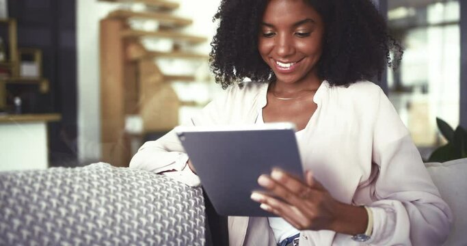 Search, tablet and happy woman relax a sofa relax with social media, chat or ebook at home. Digital, app and female person smile in living room with online sign up service, reading or communication