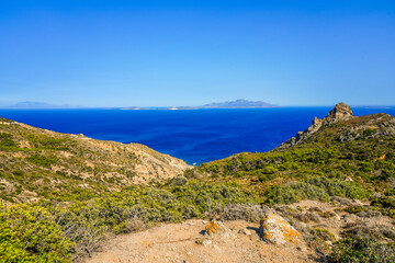Fototapeta premium View of the landscape and the Mediterranean Sea from a mountain on the Greek island of Kos. 