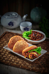 traditional chinese Hong Kong dim sum steamed fresh hot burger man tou with gong bao chicken meat...