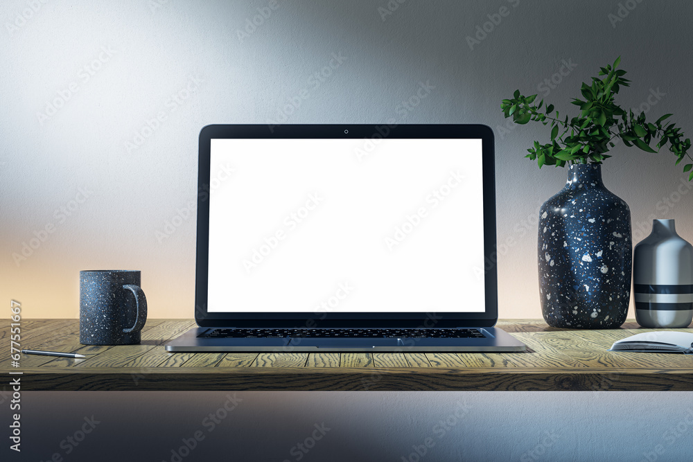Poster close up of modern dark designer desktop with empty laptop screen, coffee cup, supplies and other it