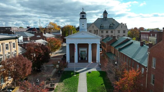 Shenandoah Valley Civil War Museum and Old Frederick County Courthouse in downtown Winchester, Virginia in autumn. Aerial establishing shot.