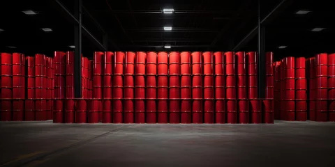 Fotobehang Red barrels neatly arranged in an otherwise empty warehouse © Putra