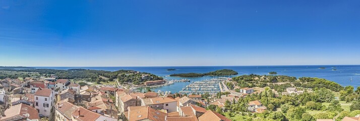Fototapeta premium Panoramic picture of the Croatian harbor town of Vrsar on the Limski Fjord from the church bell tower