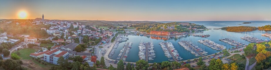 Panoramic drone picture of the Croatian harbor town of Vrsar on the Limski Fjord from the church bell tower - obrazy, fototapety, plakaty