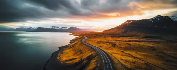 Foto auf Acrylglas Scenic road in Iceland, beautiful nature landscape aerial panorama, mountains and coast at sunset, nordic © Jasmina