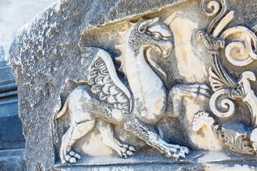 Griffin sculptures, winged mythical creature at Didyma Apollo temple (Didimeion). Marble relief. Didim (Aydin), Turkey (Turkiye)