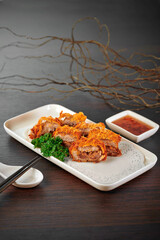 traditional chinese herbal roasted duck yam fresh meat roll main course in plate on grey vintage background cafe hotel luxury halal food restaurant banquet menu