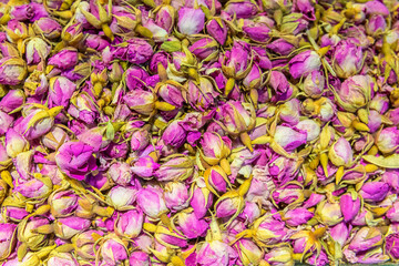 Herbal tee sold at Egypt Bazaar (Misir Carsisi) in Istanbul, Turkey (Turkiye). Multicolor rose blossoms. Selected focus, copy space, colorful background or wallpaper