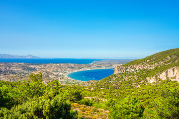 View of the landscape and the Mediterranean Sea from a mountain on the Greek island of Kos.	