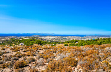 View of the landscape and the Mediterranean Sea from a mountain on the Greek island of Kos.	