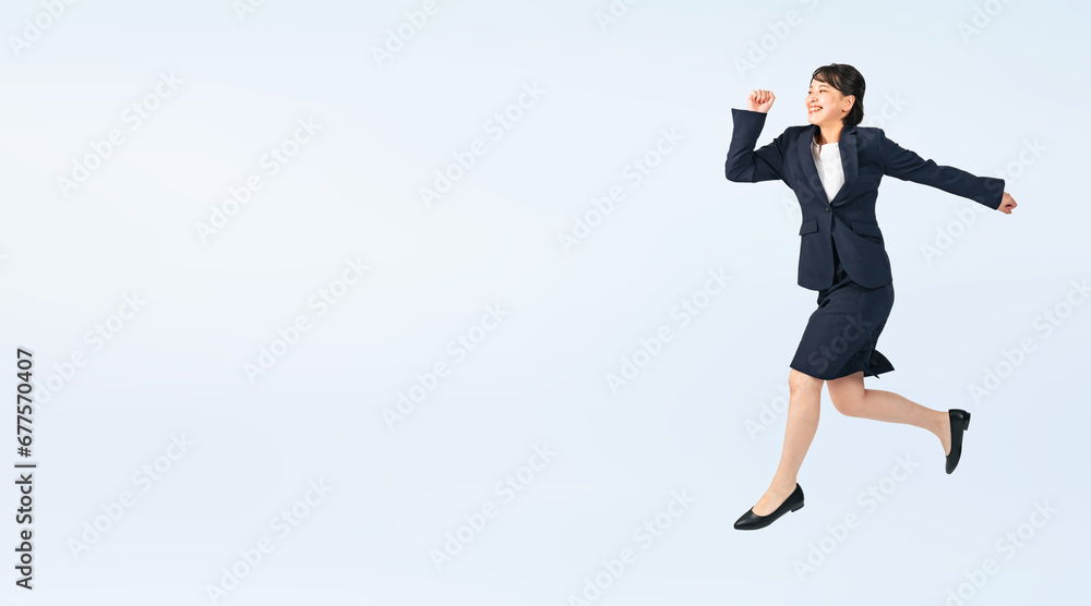 Poster ジャンプするスーツを着た女性　切り抜き全身写真（切り抜き背景透過pngも販売しております。作成者リンクから「png」で検索してください）