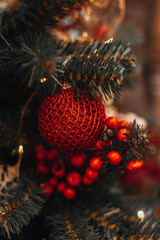 New year winter season. Holiday fairy details. Christmas tree green branches decorated with red...