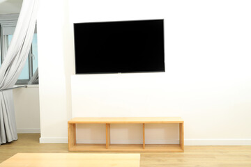 TV on the wall in the apartment