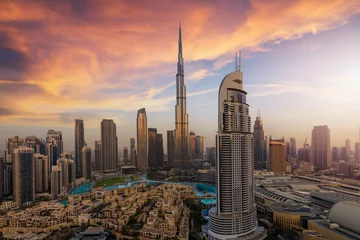 Photo sur Aluminium Aube Panoramic sunrise view of the downtown district skyline of Dubai, UAE, with Business Bay Skyscrapers