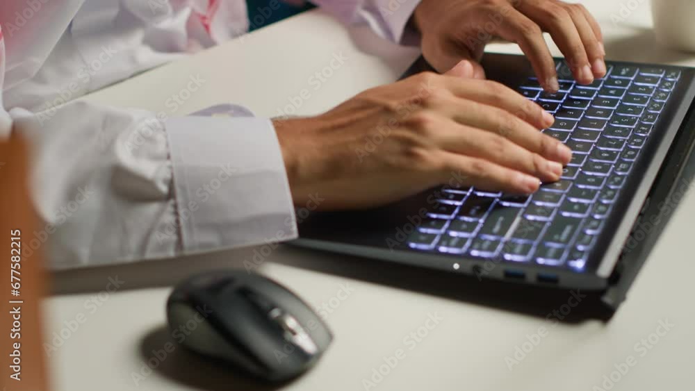Poster close up shot of businessman using laptop in office to write emails. employee typing on notepad keyb