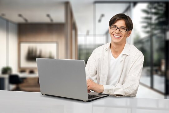 Confident smiling man using laptop, AI generated image