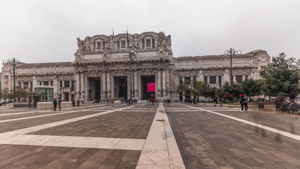 Obraz premium Panorama showing Milano Centrale timelapse - the main central railway station of the city of Milan in Italy.